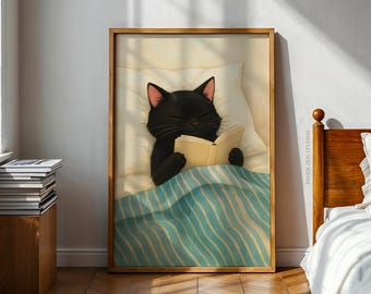 May include: A framed print showing a black cat reading a book in bed. The cat is under a blue and white striped blanket, resting on a white pillow. The artwork has a warm, inviting aesthetic, suitable for a cosy bedroom.