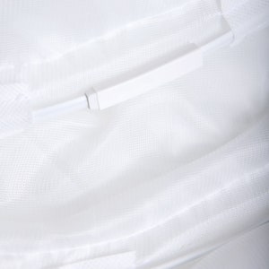 May include: White mesh fabric with a white plastic zipper pull. The zipper pull is attached to the fabric with a white cord.
