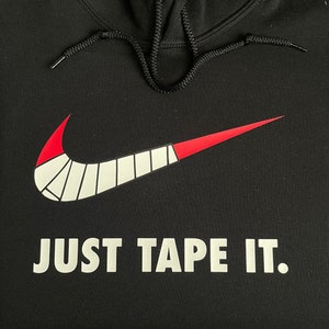 Sweat à capuche / Pull sport sport / Sweat à capuche Gildan / Bandes adhésives aux chevilles / Il suffit de coller