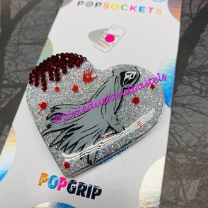 Too die for Halloween Screams!  Love Horror Movies?  SCreeeem your face off with this one! Ghost Phone Socket - Phone Grip - Scary Movie