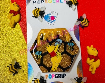 What's all the Buzzzzzz about?!? Silly old Pooh Bear and his Hunny pot Badge Reel or Phone Accessory - Winnie the Pooh