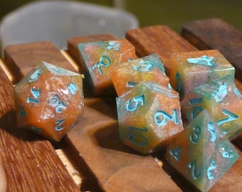 Pro Dice set hand made.  Custom summer sunset color theme with sky blue cloud numbering.