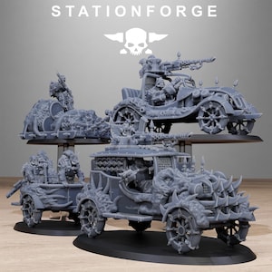 May include: A collection of gray resin miniature vehicles and figures from StationForge. The set includes two armored cars with spiked grilles, mounted weaponry, and seated figures, alongside a trailer loaded with supplies and additional figures.