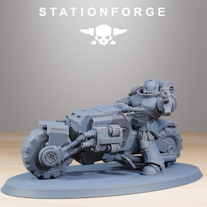 May include: A gray, futuristic motorcycle with a detailed rider figure, set on a gray base. The motorcycle has large, textured tires and complex mechanical components. The text "STATIONFORGE" is at the top.
