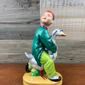 Japanese Hand Painted Figurine of a Boy Riding on a Goose - Shafford Made in Japan