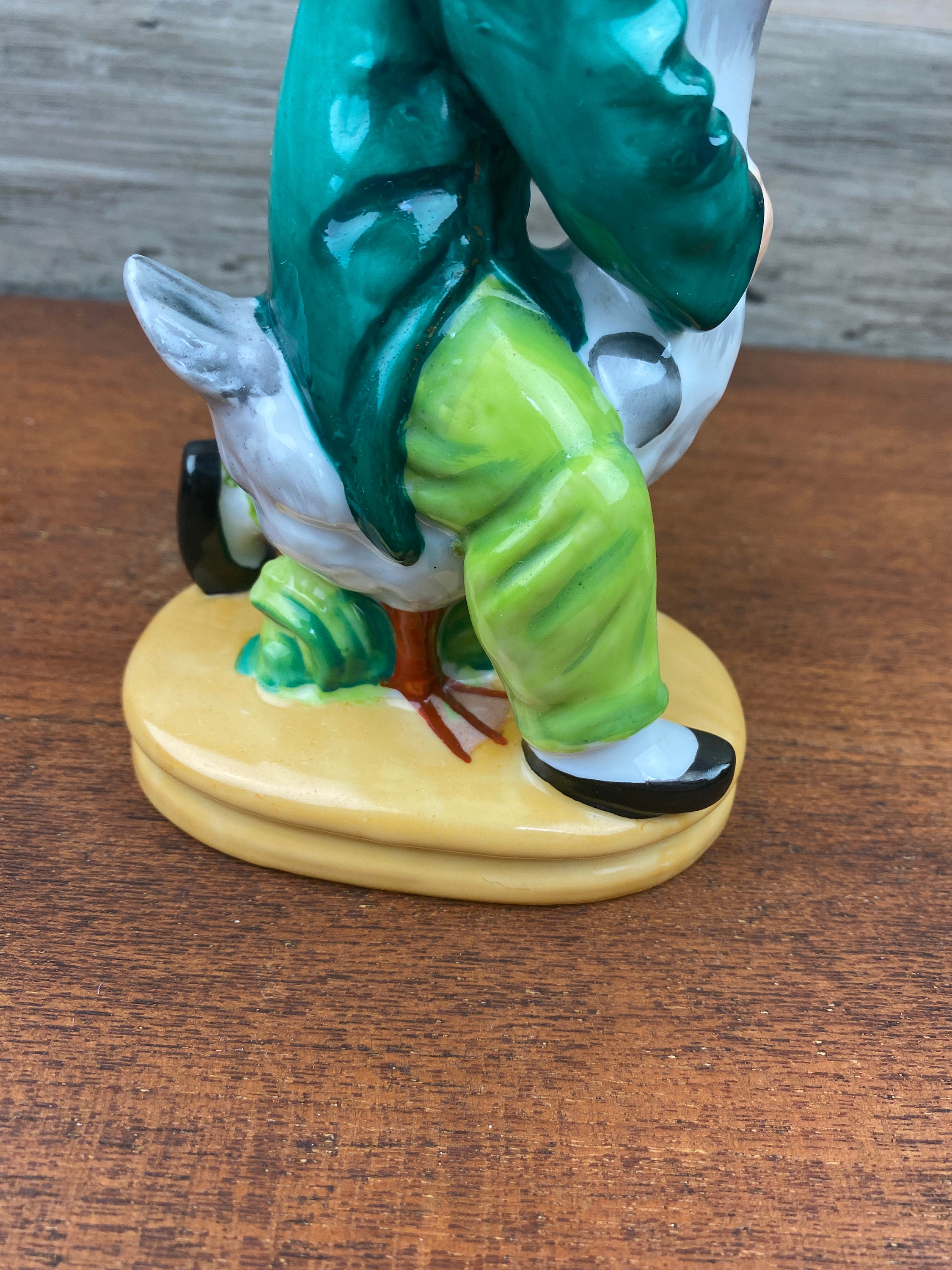Japanese Hand Painted Figurine of a Boy Riding on a Goose