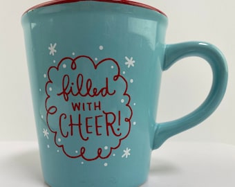Taza navideña navideña del Polo Norte de Hallmark: llena de alegría navideña