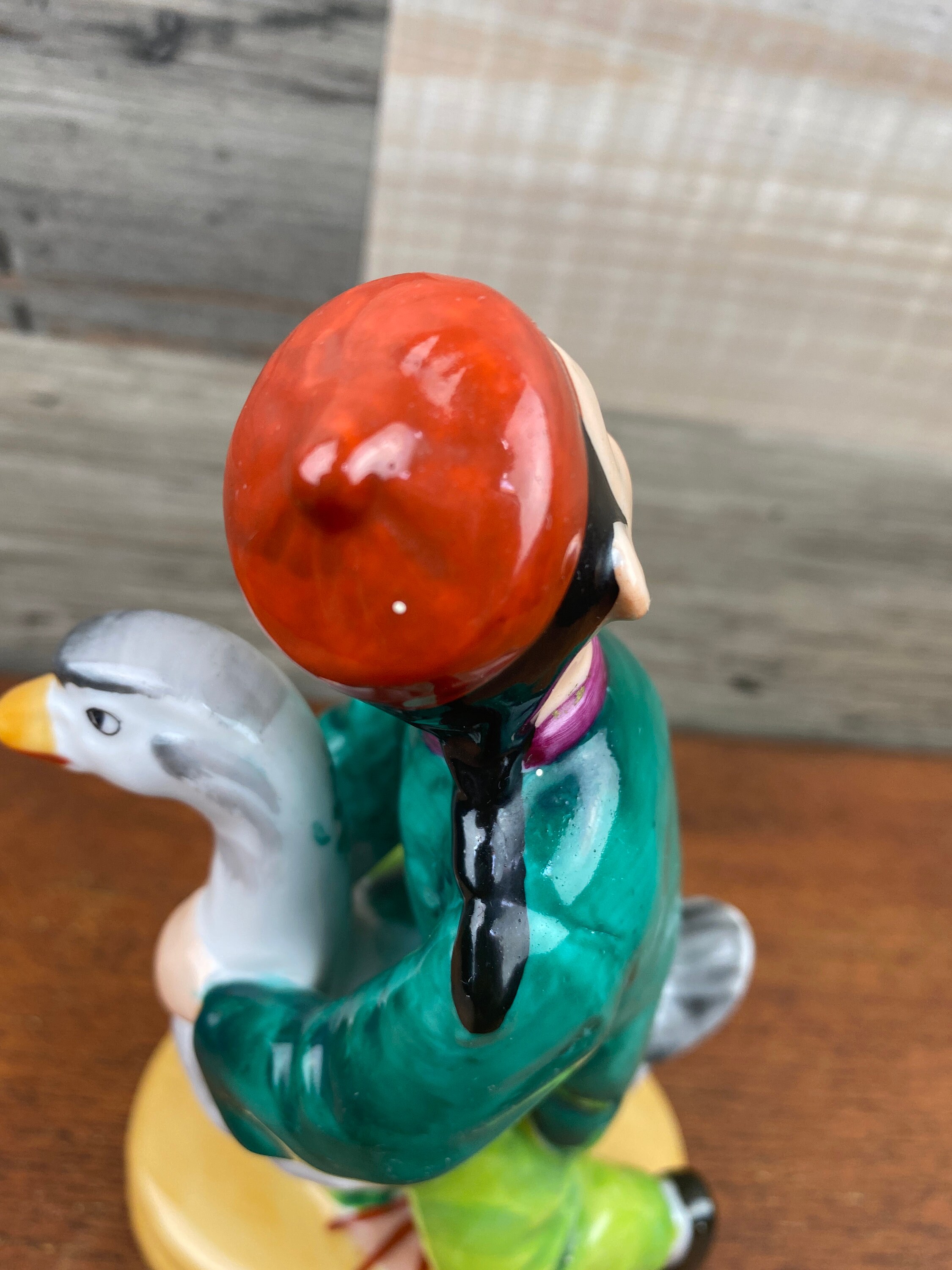 Japanese Hand Painted Figurine of a Boy Riding on a Goose