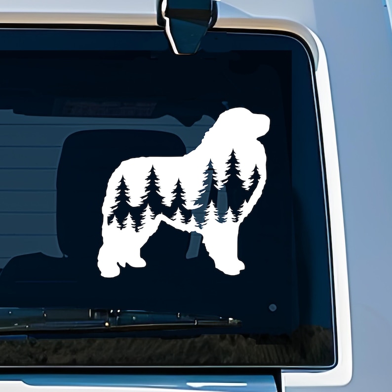 May include: White silhouette of a dog with a forest scene inside the silhouette. The dog is standing on all four legs with its head turned to the left. The forest scene is made up of pine trees.