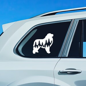 May include: White silhouette of a dog with a forest inside its body, on a white car with a black window. The dog is facing the right side of the image.
