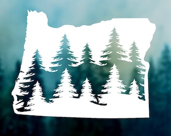 May include: A white silhouette of the state of Oregon with a forest of pine trees inside the outline. The background is a blurred image of a forest.