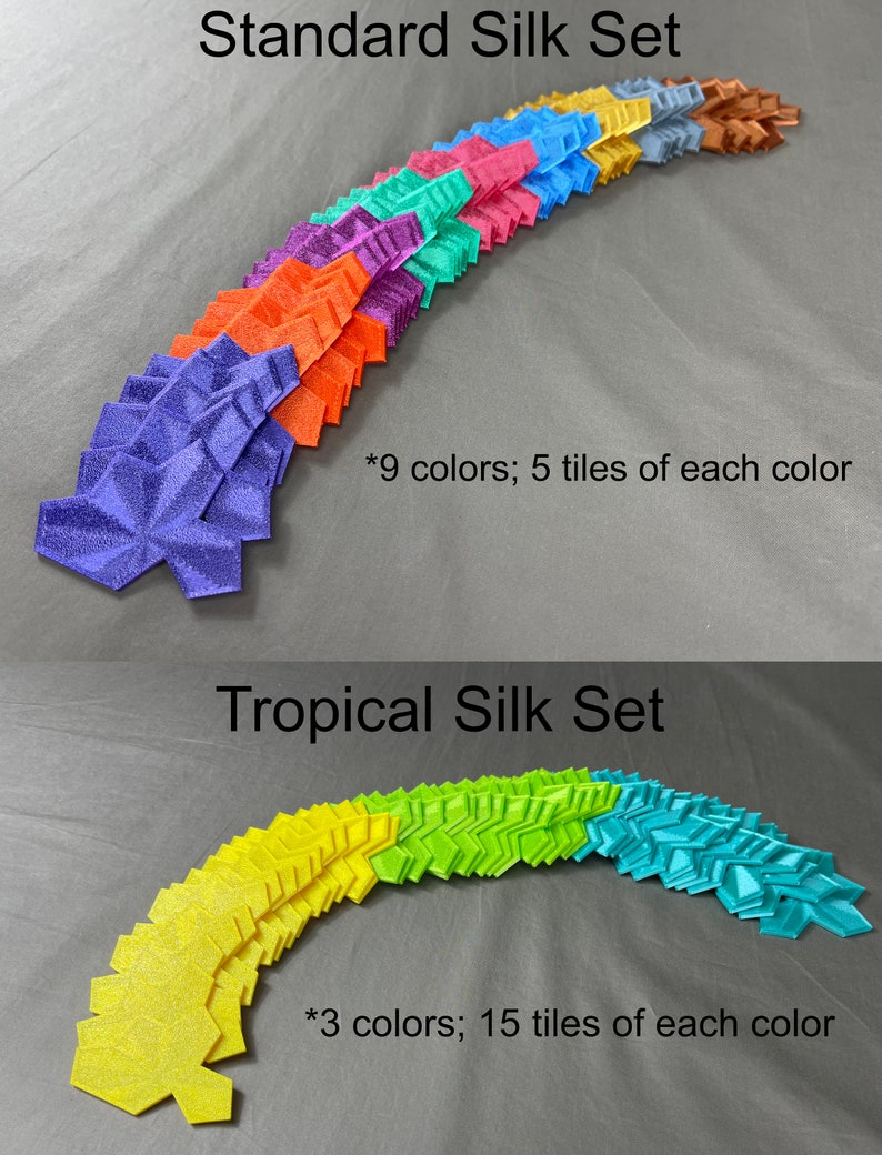 May include: Two sets of colorful, geometric tiles arranged in a curved pattern. The top set is labeled "Standard Silk Set" and includes 9 colors with 5 tiles of each color. The bottom set is labeled "Tropical Silk Set" and includes 3 colors with 15 tiles of each color.