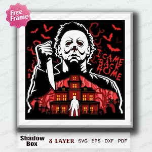May include: A black and white shadow box design featuring a menacing figure holding a knife, with the text "I CAME BACK HOME". The design includes bats, a haunted house, and a silhouette of a person. The words "Shadow Box" and "8 Layer" are also present.
