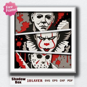May include: A layered shadow box art piece featuring three horror movie characters in a white frame. The top section shows a masked figure with a knife, the middle shows a clown with red makeup, and the bottom shows a hockey-masked figure with a blade.