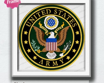 May include: A square white frame containing a circular United States Army emblem featuring a central eagle with a shield, olive branch, and arrows, surrounded by the text UNITED STATES ARMY and stars, with a pink Free Frame tag and text below.