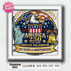 May include: A framed shadow box design featuring patriotic imagery. The design includes an eagle, the American flag, the Statue of Liberty, and the Liberty Bell. Text reads "AMERICA 250" and "250 YEARS OF INDEPENDENCE".