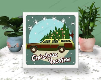 May include: A retro-style illustration of a station wagon with a Christmas tree strapped to the roof. The car is driving through a snowy scene with a blue sky and white snowflakes. The text "Christmas Vacation" is written below the car.