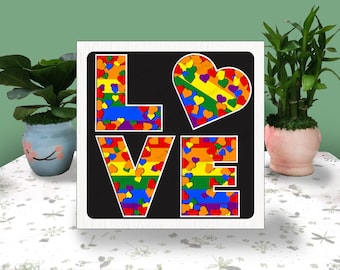 May include: A black background with the word "LOVE" spelled out in large white letters. Each letter is filled with a pattern of small rainbow hearts.