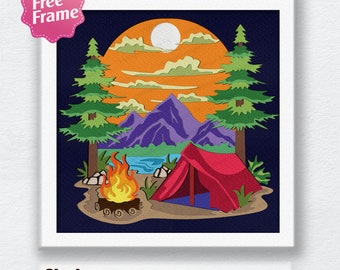 May include: A digital illustration of a camping scene with a red tent, a campfire, and mountains in the background. The sun is setting behind the mountains, and there are trees on either side of the scene. The text "Shadow Box 30 LAYER" is at the bottom of the image.