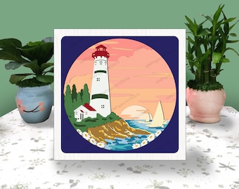 May include: A white lighthouse with a red roof stands on a rocky cliff overlooking a blue ocean with two sailboats. The sky is a vibrant orange and pink sunset with clouds. The scene is framed in a blue circle with white daisies around the edge.