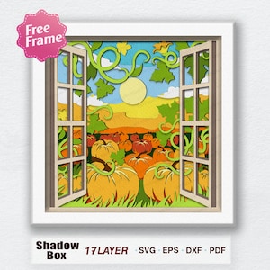May include: A paper craft shadow box with a window scene of a pumpkin patch. The window is open and the scene shows a field of pumpkins with vines and leaves. The sky is blue with a yellow sun and white clouds. The text "Shadow Box 17 LAYER" is at the bottom of the image.