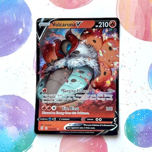 May include: Volcarona V Pokemon card, a basic card with a red, white, and black background. The card features a large illustration of Volcarona V, a fire-type Pokemon with a red, white, and black body. The card has two attacks: Surging Flames and Fire Blast. The card has a HP of 210.