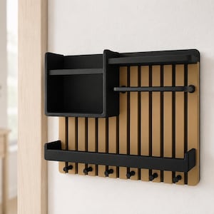 May include: A wall-mounted organizer featuring a light wood-toned slatted back panel with black accents. It includes a deep rectangular storage bin, two horizontal shelves, and six small black hooks along the bottom edge for hanging items.
