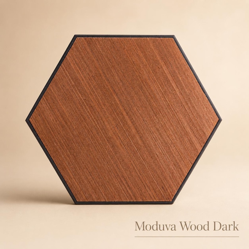 May include: Hexagonal wooden panel with a dark brown wood grain pattern and a black border. The panel has a modern design and the text "Moduva Wood Dark" is displayed at the bottom.