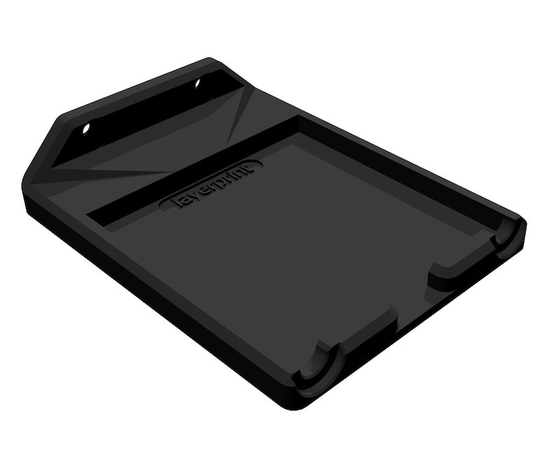 Puede incluir: Una estanter&iacute;a de pared negra y rectangular con una bandeja empotrada y una secci&oacute;n trasera elevada. La secci&oacute;n trasera tiene dos agujeros circulares y un dise&ntilde;o triangular. El texto "layerprint" es visible en la bandeja.