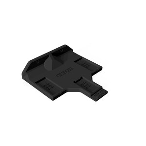 May include: A black plastic tool with a unique shape, featuring multiple rectangular sections with small holes and a raised central area. The word "faverton" is visible on the surface.