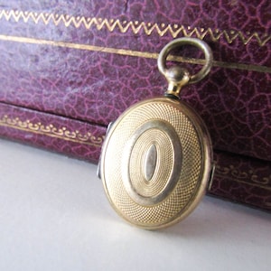 Antique Guilloche Gold Gilt Locket with interior glass frames, Small French Photo Locket