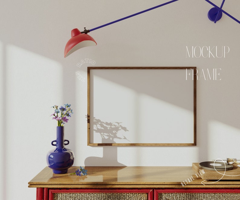 May include: A wooden frame mockup with a white background, a red lamp, a blue vase with flowers, and a record player on a wooden table with a red and brown striped front.