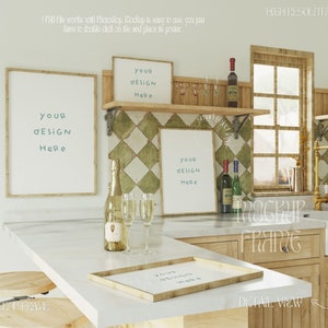 May include: A kitchen interior with a wooden countertop and a wooden shelf with three framed mockups. The frames are empty and ready for your design. The countertop has a bottle of champagne and two champagne flutes. The shelf has two bottles of wine and a few glasses. The background is a tiled wall with a window and a sink.