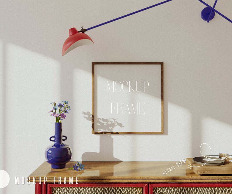 May include: A wooden picture frame with a white background and the text "MOCKUP FRAME" in white. The frame is on a wooden shelf with a blue vase with flowers and a record player.