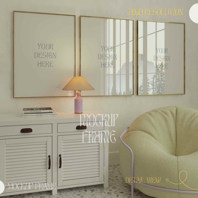 May include: A mockup scene featuring three gold-framed rectangular art prints with the text "YOUR DESIGN HERE". A white cabinet with a lamp and books sits below the frames. A light green beanbag chair is on the right.