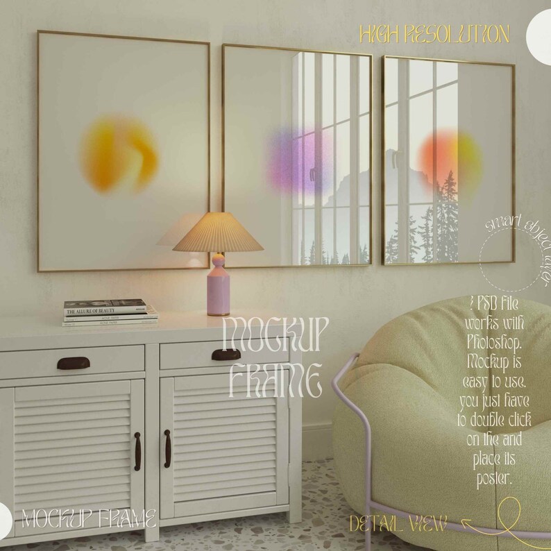 May include: Three framed art prints with gold frames, featuring abstract colorful designs. A white cabinet with a lamp and books sits below the artwork. A light green beanbag chair is in the corner. The text "MOCKUP FRAME" is visible.
