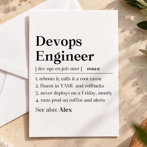 May include: A white greeting card featuring black text that defines a Devops Engineer as a noun with four humorous points including rebooting, YAML fluency, avoiding Friday deployments, and running on coffee, with a final reference to Alex.