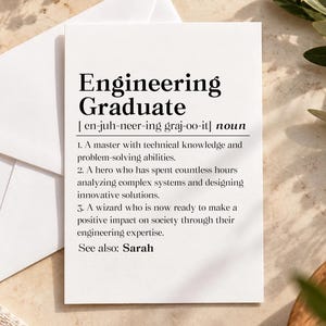 May include: A white greeting card featuring the black printed text Engineering Graduate, a phonetic pronunciation, the noun classification, and three numbered definitions describing technical knowledge, problem-solving, and innovation, ending with See also: Sarah.