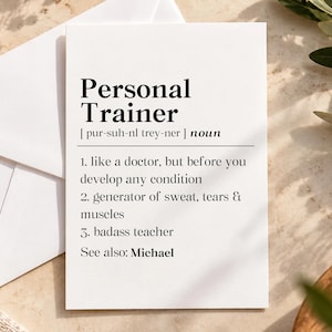 May include: A white rectangular card featuring black text that defines the term Personal Trainer. The text includes a phonetic pronunciation, the noun classification, and three numbered definitions, ending with the phrase See also: Michael.