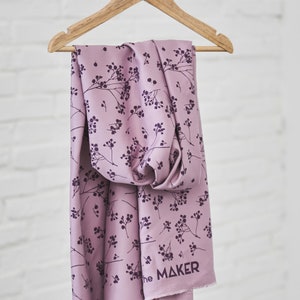 sustainable ECOVERO™ Viscose twill in lilac with floral print, 165 gr/m2 cut to length. Sold by units of 10 cm (1 mt= 10 units)