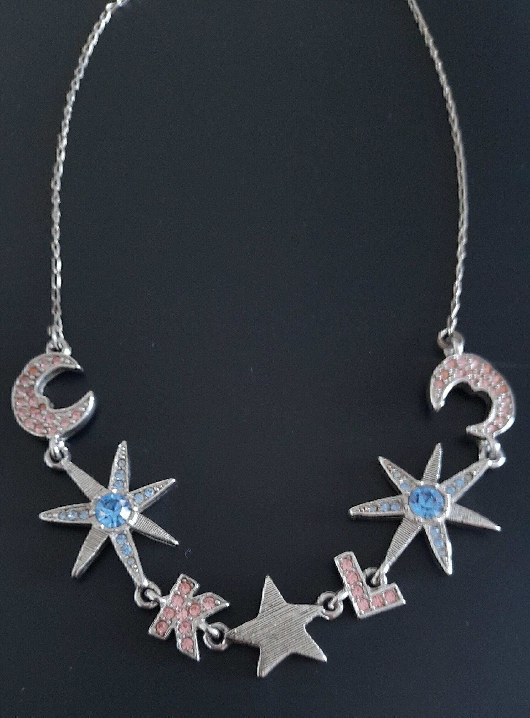 Chanel diamond star necklace best sale