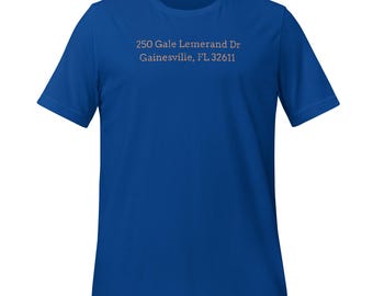 May include: A royal blue t-shirt with the text "250 Gale Lemerand Dr Gainesville, FL 32611" printed on the front in a light gray color.