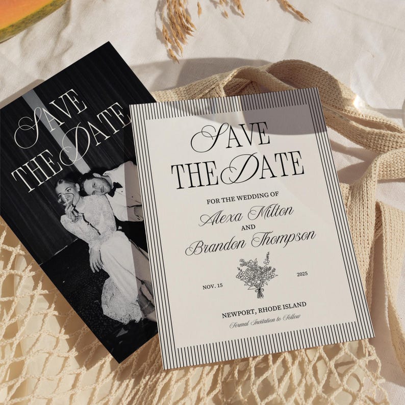 May include: Two wedding "Save the Date" cards. One card features a black and white photo of a couple. The other card has a cream background with black text that reads "Save the Date" and wedding details. The cards are on a cream-colored surface.
