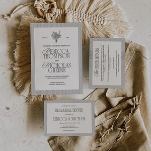 May include: A set of wedding stationery, including an invitation, details card, and rehearsal dinner card. The designs feature a striped border and classic typography. The main invitation announces the wedding of Rebecca Thompson and Nicholas Greene. The details card is titled "The Finer Details".
