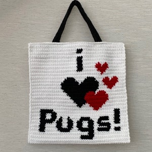 May include: White crocheted tote bag with black handles. The bag has a black and red heart design with the text "I love Pugs!" in black.