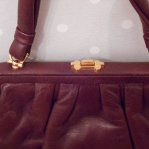 brown 1960s ruffled leather bag