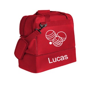 Peut inclure: Sac de sport rouge avec un graphique blanc de boules de pétanque et le nom "Lucas" imprimé sur le devant.