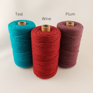 May include: Three spools of cotton rope in teal, red, and plum colors. The spools are labeled "Teal", "Wine", and "Plum".