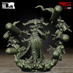 Op de afbeelding: Een monochroom olijfgroen miniatuurfiguur van een figuur met meerdere armen, gekleed in een versierd harnas met patronen en een brede, gebogen hoofdtooi. Het figuur is omringd door een cirkelvormige formatie van zwevende luchtbommen.
