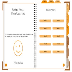 May include: A yellow and orange notebook with a spiral binding. The cover has the text "Rubrique 'Notes' Resume du contenu" and "Edition 2022". The inside of the notebook has a section labeled "Index: Notes" with numbered notes.